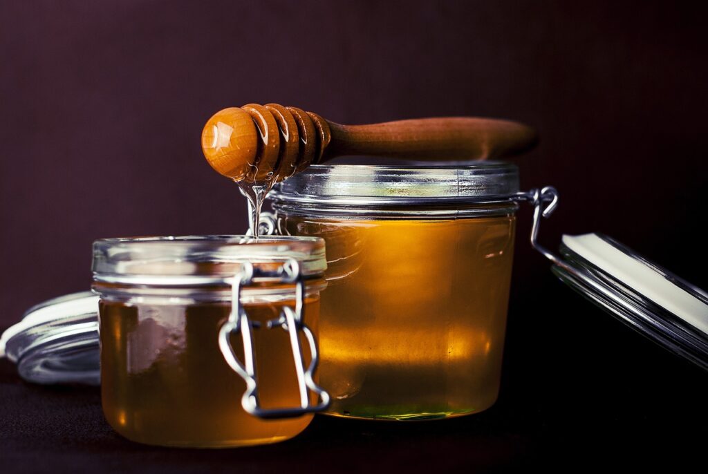 honey, jar, honey dipper-823614.jpg